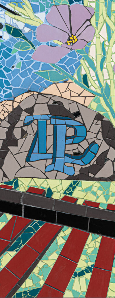 Lake Park High School logo on rock from Roselle Mosaic Completed by Roselle Arts and Culture Foundation